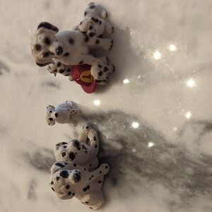 A set of 3 Dalmatian Dog/puppy figurines